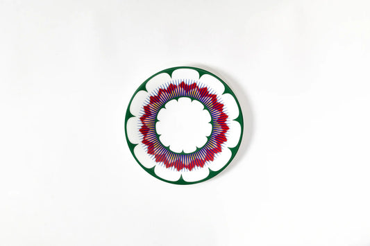 The Moss Green Small Plate is a handcrafted fine bone china piece, perfect for serving entrées, apéros, and desserts. This plate is designed for indulgence without hesitation, combining luxury and affordability for everyday use. Its translucency, durability, and lightweight feel add sophistication to any table setting. Dishwasher and microwave safe, the plate is ideal for both solo moments and gatherings with friends.