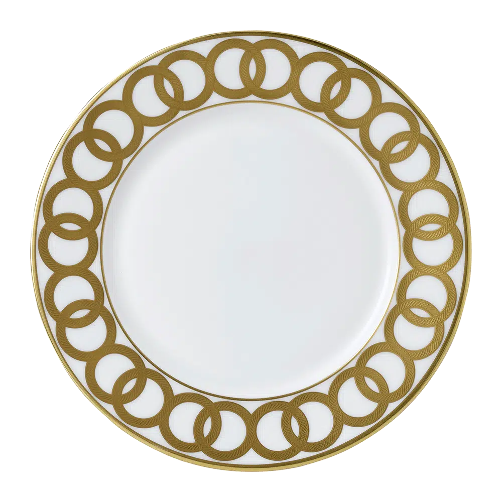 Riviera Dream White Dinner Plate, crafted in England from fine bone china with 22-carat gold accents. A luxurious and refined addition to your table. Dishwasher safe, handwashing recommended. Not microwave safe.