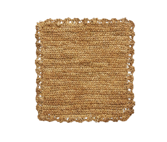 Amelia Placemats, set of 4, made of durable sisal with charming frills. Easy to clean with a damp cloth, perfect for adding a playful touch to any table setting.