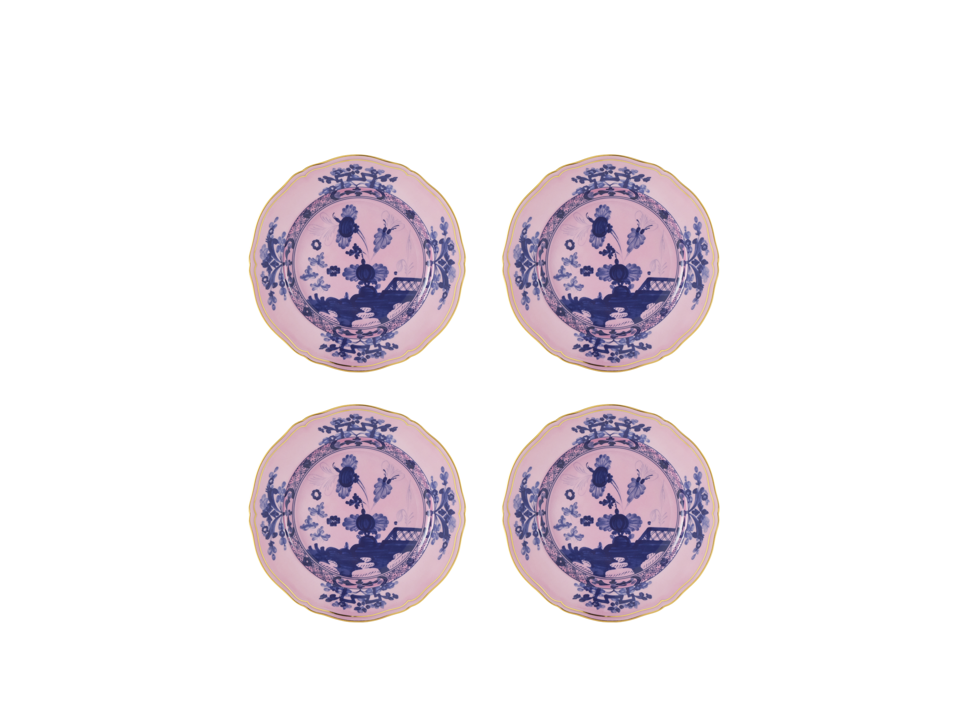 Set of four Azalea dessert plates from the Oriente Italiano collection, made of porcelain with gold threading. The plates feature a blue carnation motif against azalea pink, highlighted by hand-painted gold details on the classic Antico Doccia shape - set of four