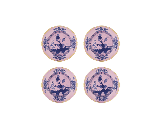 Set of four Azalea dessert plates from the Oriente Italiano collection, made of porcelain with gold threading. The plates feature a blue carnation motif against azalea pink, highlighted by hand-painted gold details on the classic Antico Doccia shape - set of four