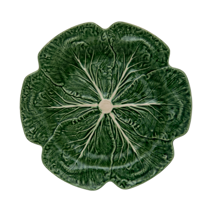 Cabbage Charger Plate made from green earthenware, designed in the shape of a cabbage. Elegant and functional, perfect for enhancing table settings and impressing guests.