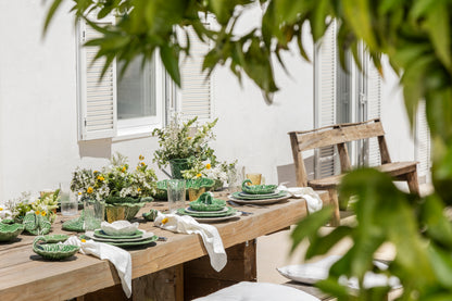 Cabbage Charger Plate made from green earthenware, designed in the shape of a cabbage. Elegant and functional, perfect for enhancing table settings and impressing guests.