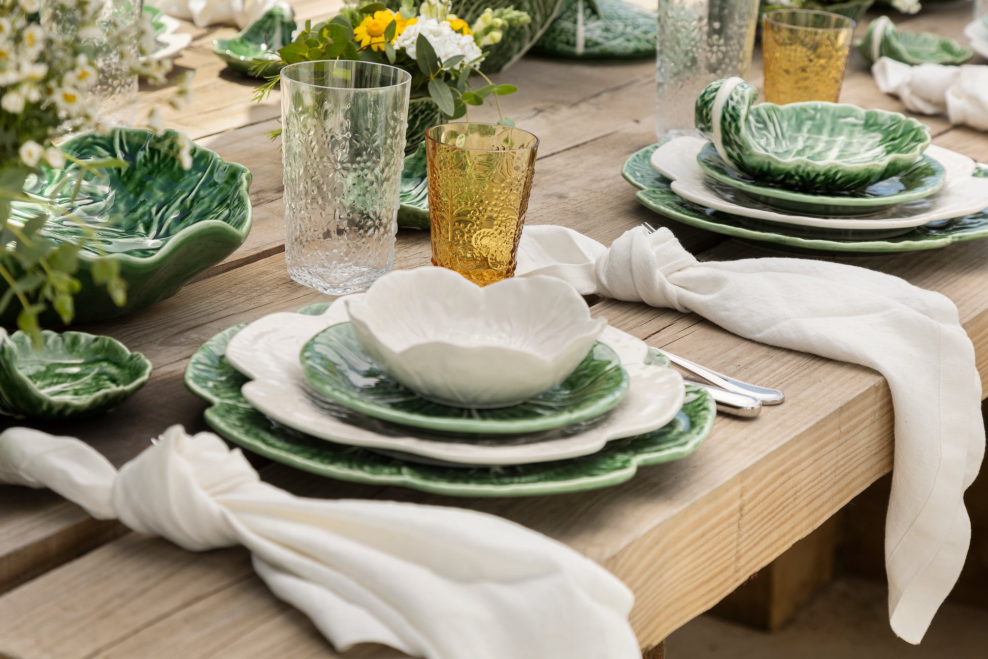 Cabbage Charger Plate made from green earthenware, designed in the shape of a cabbage. Elegant and functional, perfect for enhancing table settings and impressing guests.