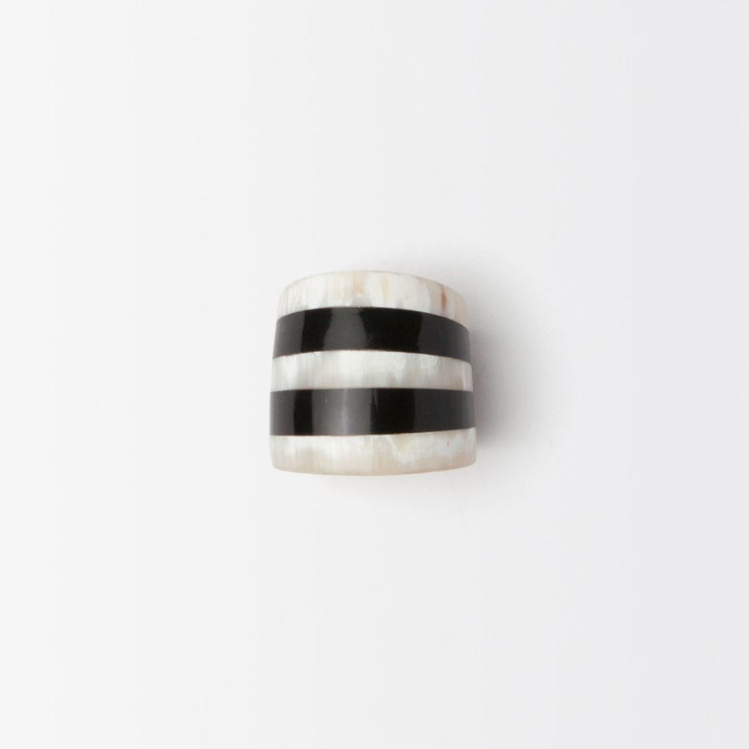 Cameron Napkin Rings, set of 4, made from black-and-white-striped horn. Chic and sophisticated, perfect for elegant table settings. Easy to clean and maintain.