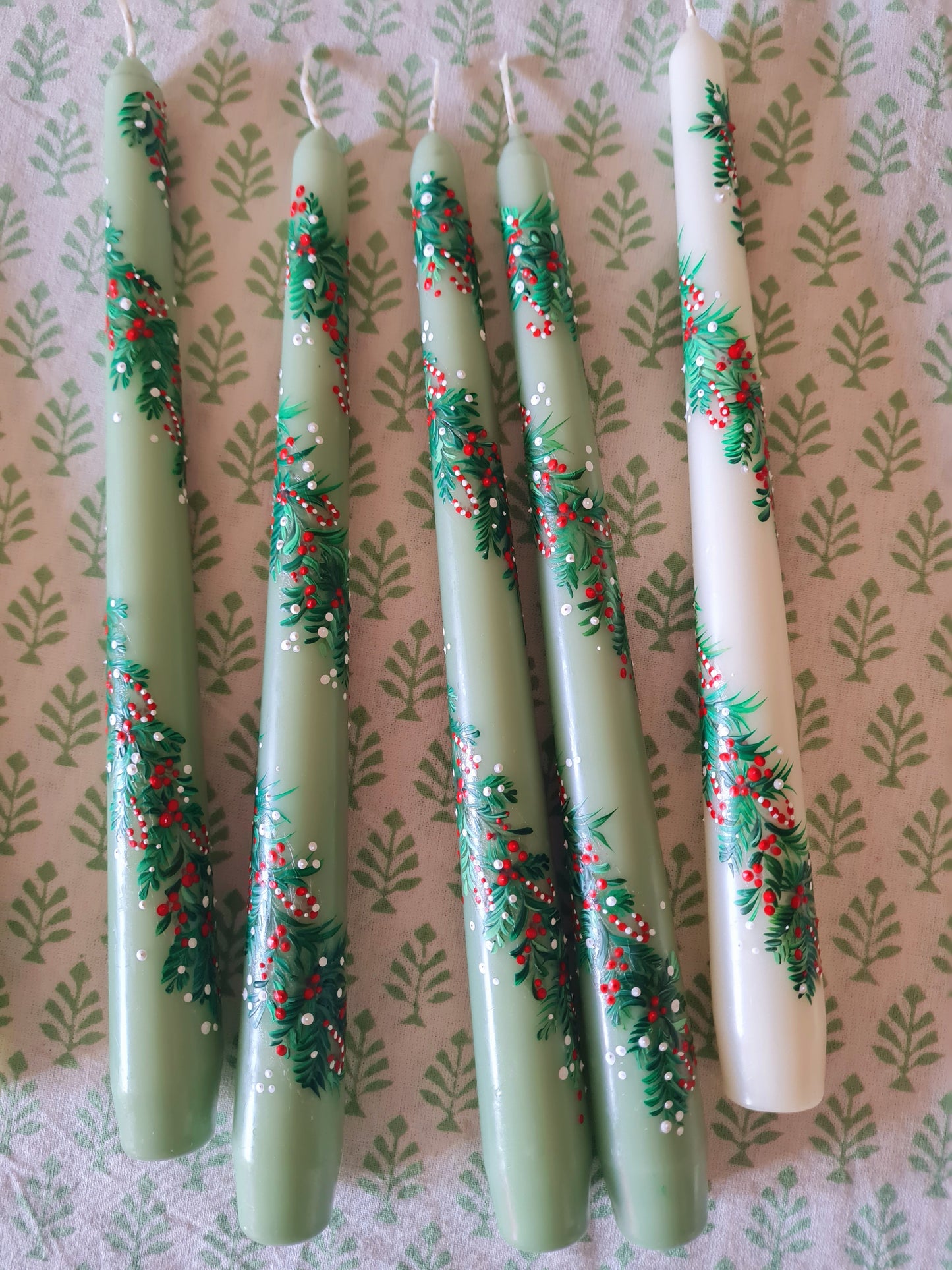 Candy Cane hand-painted green taper candle, gift-wrapped and crafted with love. Up to 5 hours of burn time. Handle with care to protect the design.