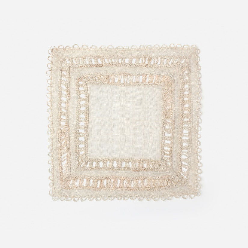 Carmine Square Placemats, set of 4, made from woven abaca with a crocheted bohemian design. Elegant and easy to clean with a damp cloth. Perfect for stylish table settings.