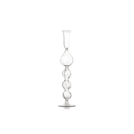 Clear Glass Candlestick with a unique handcrafted teardrop effect, perfect for adding a touch of luxury and warm candlelight to any setting.