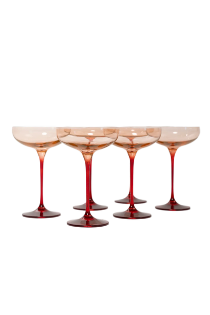 Blush Pink and Red Colored Champagne Coupe Set of 6, hand-blown by artisans in Poland. Lead, cadmium, and BPA-free glassware, 7.25 inches tall with an 8.25-ounce capacity. Limited edition.