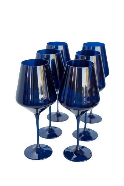 midnight blue colored wine stemware, hand-blown by Polish artisans. Each glass is 9.5 inches tall, holds 16.5 ounces, and comes in a set of 6. Lead, cadmium, and BPA-free for safe use.