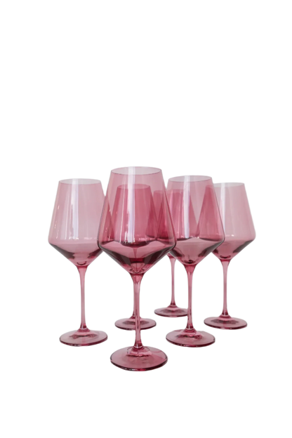 Rose colored wine stemware, hand-blown by Polish artisans. Each glass is 9.5 inches tall, holds 16.5 ounces, and comes in a set of 6. Lead, cadmium, and BPA-free for safe use.