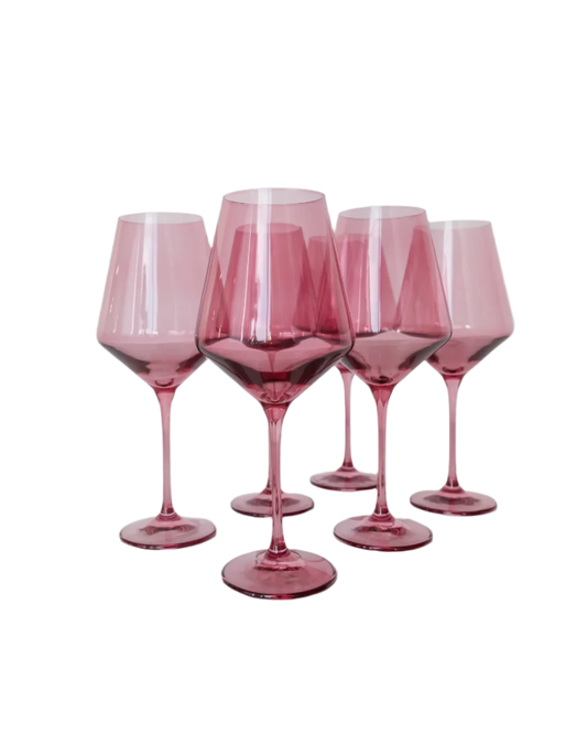 Rose colored wine stemware, hand-blown by Polish artisans. Each glass is 9.5 inches tall, holds 16.5 ounces, and comes in a set of 6. Lead, cadmium, and BPA-free for safe use.