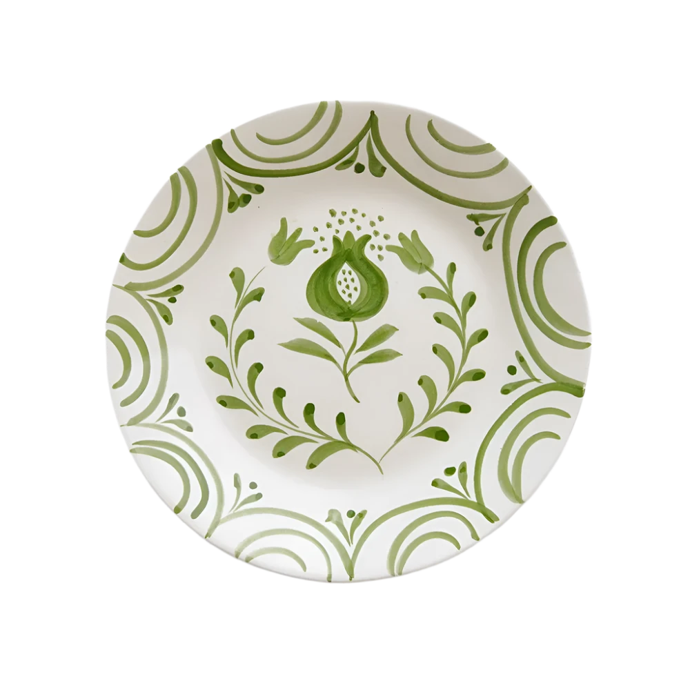 Set of 2 Crest Green Salad Plates with a hand-painted pomegranate crest design and graceful green vine patterns. Crafted from 100% ceramic, these plates are microwave and dishwasher safe. Each plate measures 8.25" in diameter. Made in Portugal.