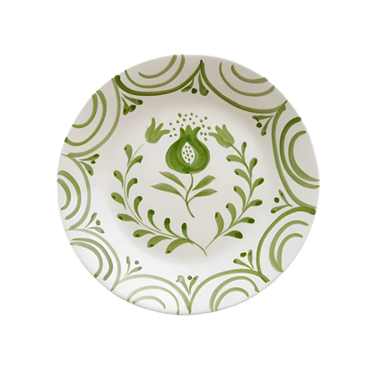 Set of 2 Crest Green Salad Plates with a hand-painted pomegranate crest design and graceful green vine patterns. Crafted from 100% ceramic, these plates are microwave and dishwasher safe. Each plate measures 8.25" in diameter. Made in Portugal.