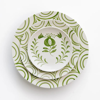 Set of 2 Crest Green Salad Plates with a hand-painted pomegranate crest design and graceful green vine patterns. Crafted from 100% ceramic, these plates are microwave and dishwasher safe. Each plate measures 8.25" in diameter. Made in Portugal.