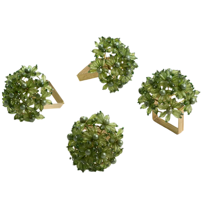 Set of 4 Green Bouquet Beaded Napkin Rings adorned with intricate green beads, perfect for adding a festive touch to your dining table. Made in India, these napkin rings are ideal for holiday gatherings and nature-inspired decor.