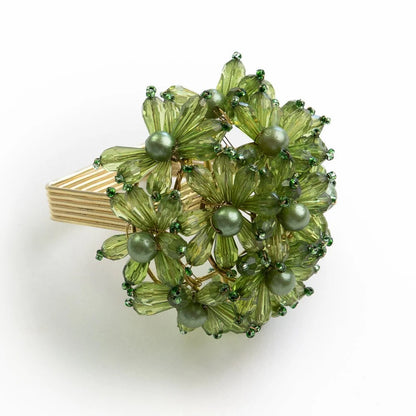 Set of 4 Green Bouquet Beaded Napkin Rings adorned with intricate green beads, perfect for adding a festive touch to your dining table. Made in India, these napkin rings are ideal for holiday gatherings and nature-inspired decor.