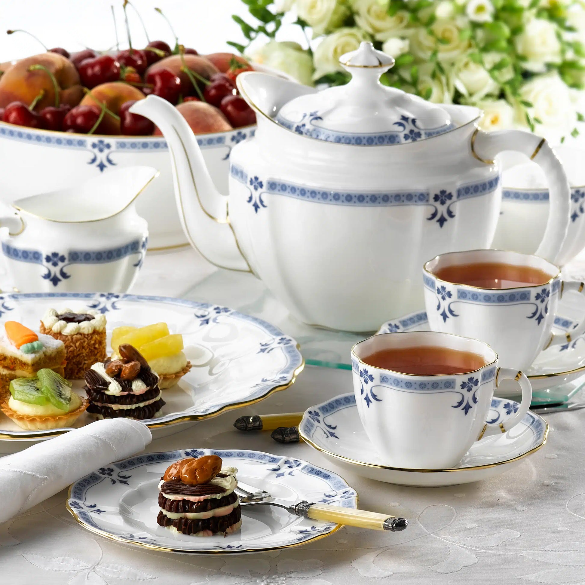 Grenville Salad Plate, crafted in England from fine bone china and adorned with 22-carat gold accents. A sophisticated choice for any table setting. Dishwasher safe, handwashing recommended. Not microwave safe.