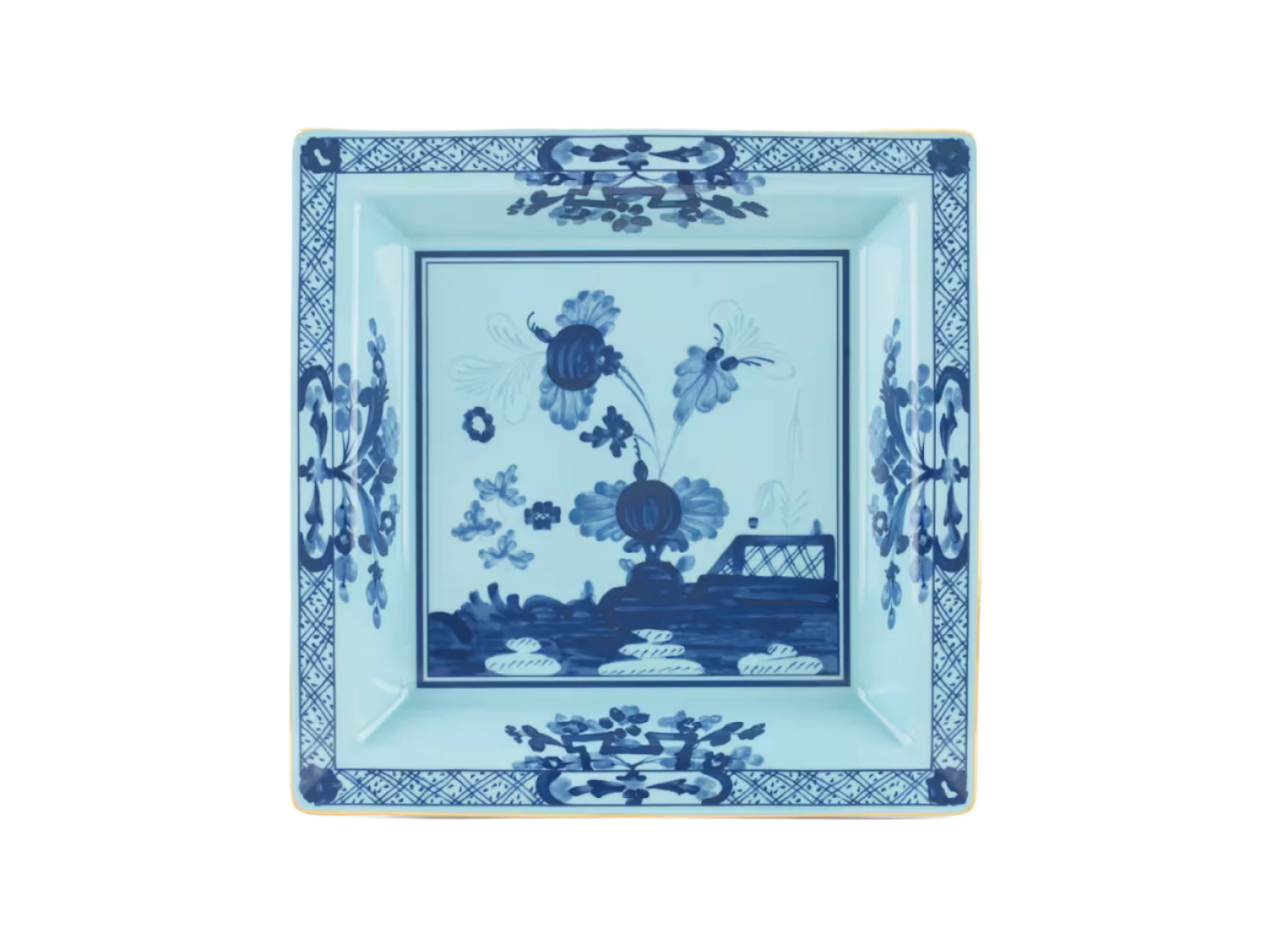 Iris square change tray in porcelain with gold threading from the Oriente Italiano collection. Features a contrasting blue carnation floral motif against iris blue porcelain with gold threading along the Antico Doccia shape.