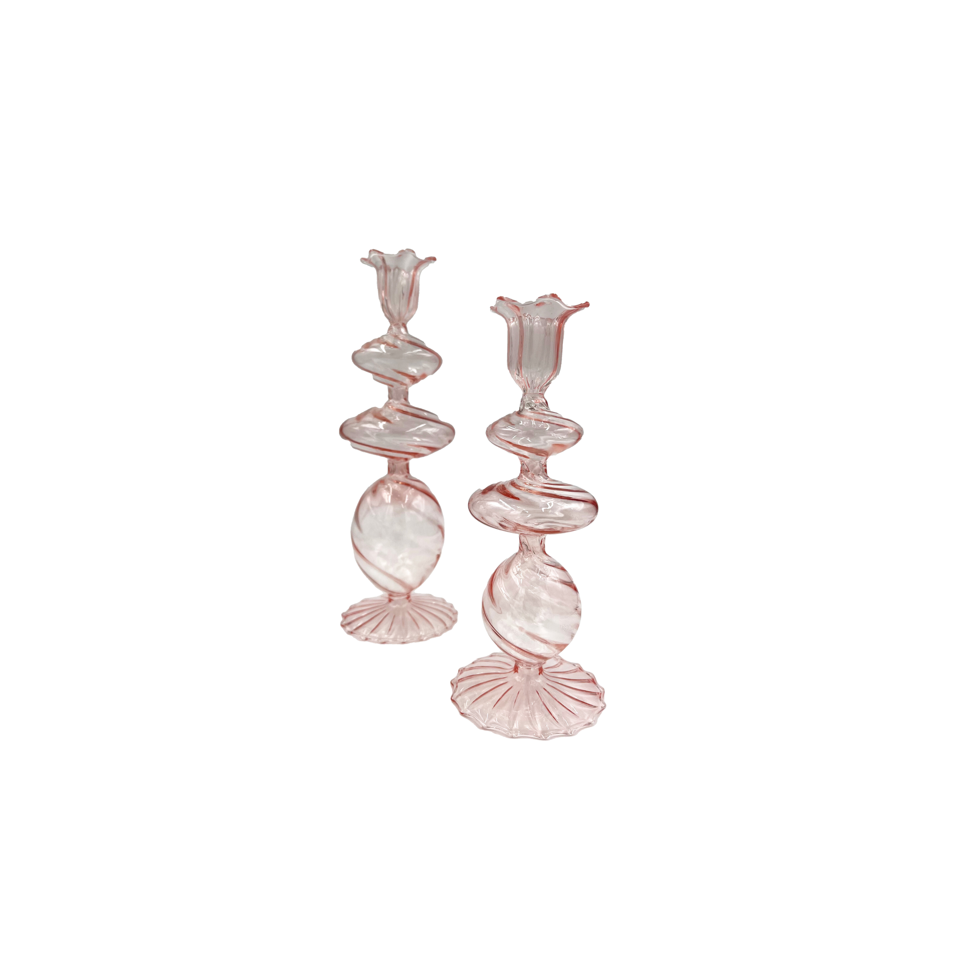 Charming pink candlesticks made from mouth-blown borosilicate glass, perfect for adding a stylish touch to any dining table.