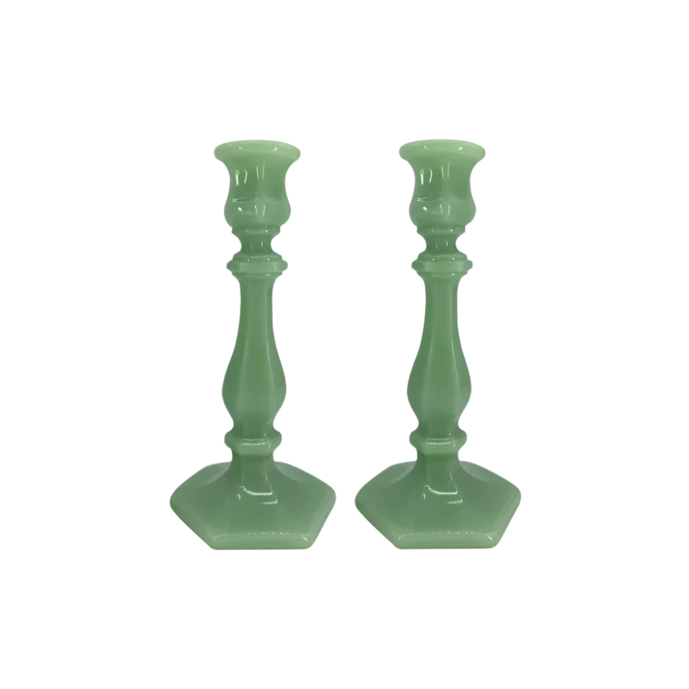 Green Glass Candle Holders featuring a sleek design that adds a soft glow to your home. Ideal for creating a warm, romantic atmosphere, these holders are perfect for intimate dinners or as elegant decorative pieces.