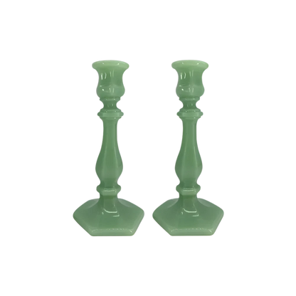 Green Glass Candle Holders featuring a sleek design that adds a soft glow to your home. Ideal for creating a warm, romantic atmosphere, these holders are perfect for intimate dinners or as elegant decorative pieces.