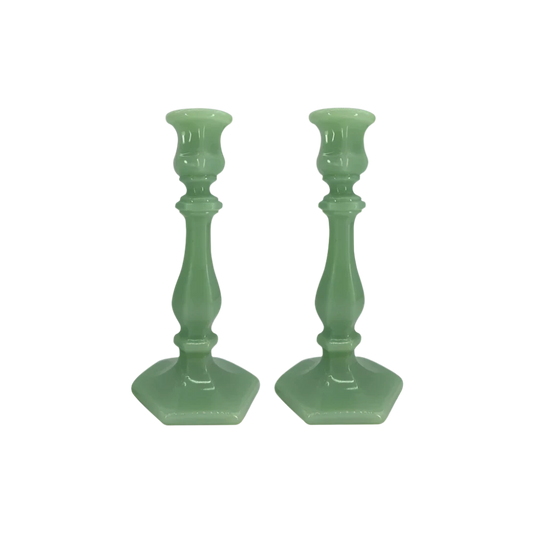 Green Glass Candle Holders featuring a sleek design that adds a soft glow to your home. Ideal for creating a warm, romantic atmosphere, these holders are perfect for intimate dinners or as elegant decorative pieces.