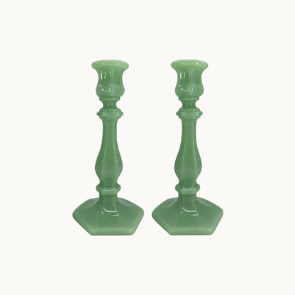 Green Glass Candle Holders featuring a sleek design that adds a soft glow to your home. Ideal for creating a warm, romantic atmosphere, these holders are perfect for intimate dinners or as elegant decorative pieces.