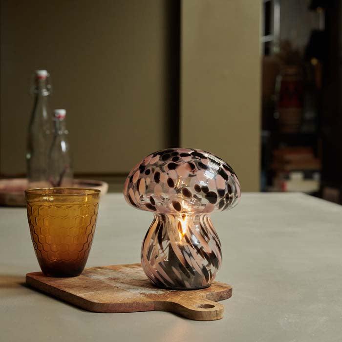 Cordless LED lamp with a marbled pink and brown glass mushroom design, ideal for lighting dark corners, coffee tables, or bedside tables. Sculptural and battery-operated for flexible styling options around the home.