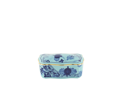 Iris rectangular porcelain box with cover from the Oriente Italiano collection, featuring a blue carnation motif on iris blue porcelain with hand-painted gold threading. Box measures 5.5 inches.