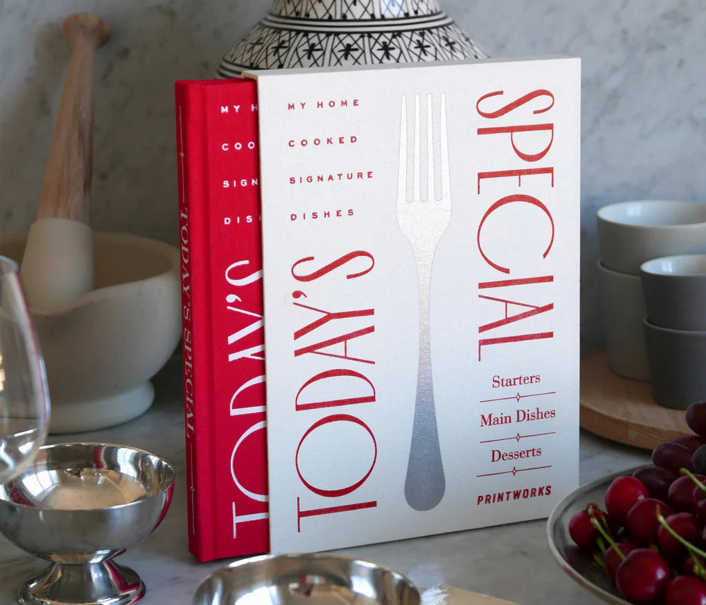 Elegant red recipe book with 50 sheets of wood-free paper, lined for ingredients and directions, stored in an ivory white slipcase for protection. Ideal for writing down your favorite dishes.