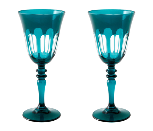 Rialto Wine Glass, set of 2, inspired by Venice's Rialto Bridge. Handcrafted in Turkey, each glass features unique color and cutwork. Holds 9 oz and perfect for adding a festive touch to your table. Hand-wash with a soft cloth and soapy water.