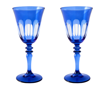 Rialto Wine Glass, set of 2, inspired by Venice's Rialto Bridge. Handcrafted in Turkey, each glass features unique color and cutwork. Holds 9 oz and perfect for adding a festive touch to your table. Hand-wash with a soft cloth and soapy water.