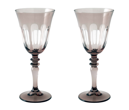 Rialto Wine Glass, set of 2, inspired by Venice's Rialto Bridge. Handcrafted in Turkey, each glass features unique color and cutwork. Holds 9 oz and perfect for adding a festive touch to your table. Hand-wash with a soft cloth and soapy water.