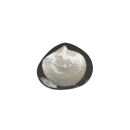 Round Caviar Dish in Black, handmade from resin and mother-of-pearl shell, offering a sophisticated design for dining or display. Hand wash only.