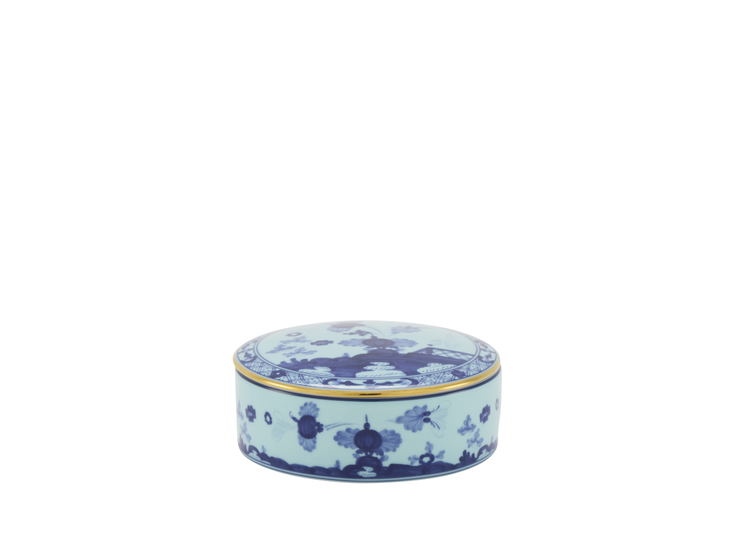 Round porcelain trinket box with a cover, featuring blue Garofano (Carnation) motif contrasted against an Iris blue background with gold threading.