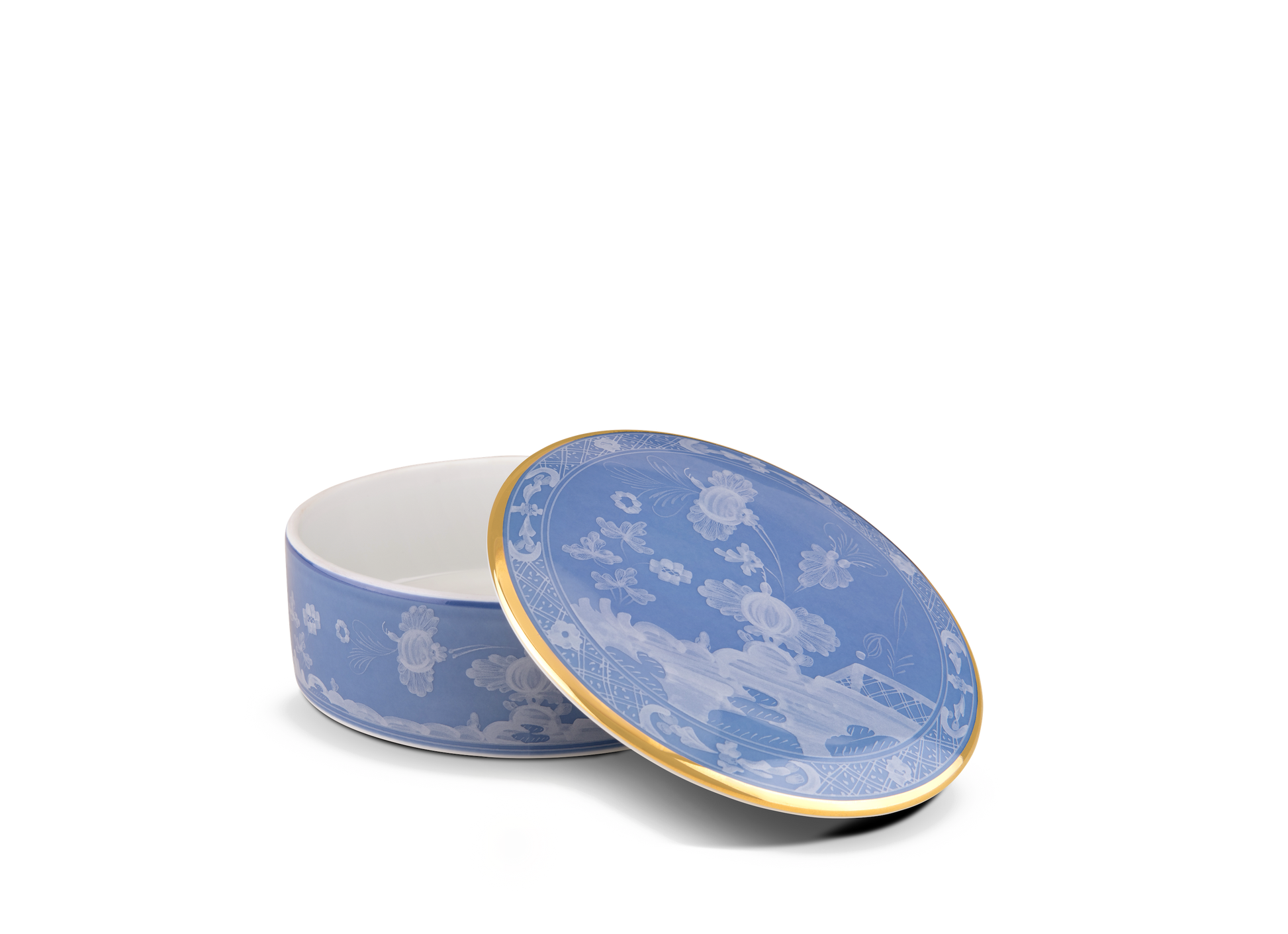 Round trinket box with cover, 13cm (5 inches), in porcelain with gold threading from the Oriente Italiano collection. Features the iconic 'carnation' motif in Pervinca with periwinkle blue decoration and delicate tone-on-tone floral design