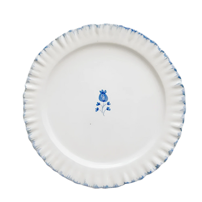 Set of 2 Cobalt Blue Ruffled Dinner Plates with hand-painted cobalt blue accents along the edge. Made from 100% ceramic, these plates are microwave and dishwasher safe. Each plate measures 10.5" in diameter. Made in Portugal.