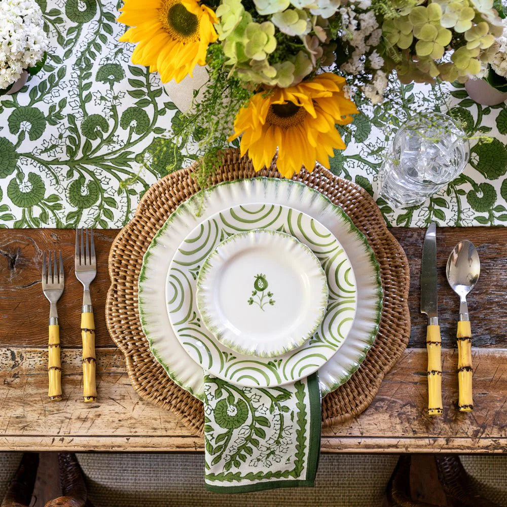 Set of 4 Ruffled Green Ceramic Plates with a soft green border and delicate ruffled edges. Each plate measures 5.5" in diameter, perfect for appetizers or small dishes. Microwave and dishwasher safe. Made in Portugal.