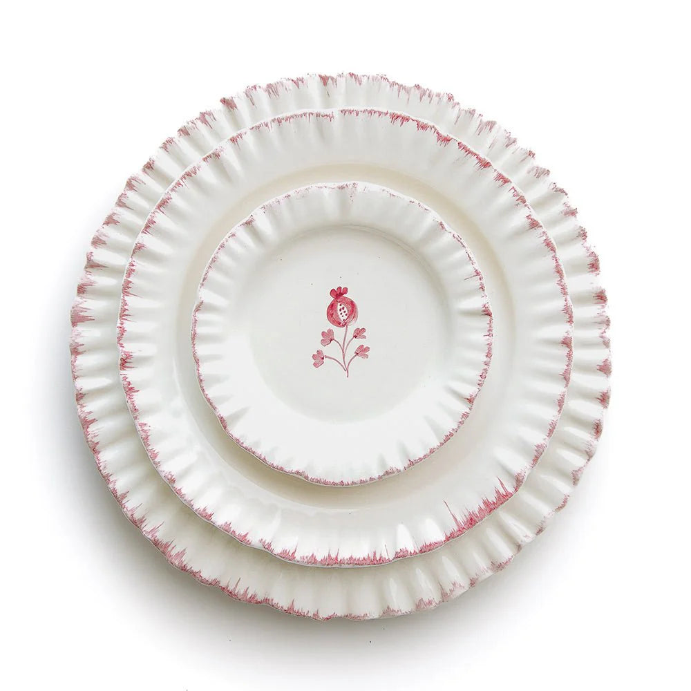 Set of 2 hand-painted Ruffled Rose Dinner Plates with soft pink edging, ruffled rim, and a delicate floral motif at the center. Made from 100% ceramic, microwave and dishwasher safe. Each plate measures 10.5" in diameter. Made in Portugal.