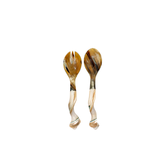 Handcrafted Seychelles Servers made from natural horn and seashells, 9.5" in length. Each piece is unique and designed for stylish serving. Hand wash recommended.