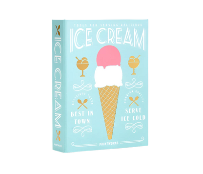 Essential Ice Cream Kit in an elegant book-like box, containing 2 cone shapes, an ice cream scoop, and 2 sprinkle scoops, all made of stainless steel and dishwasher safe. Perfect for hosting ice cream parties.