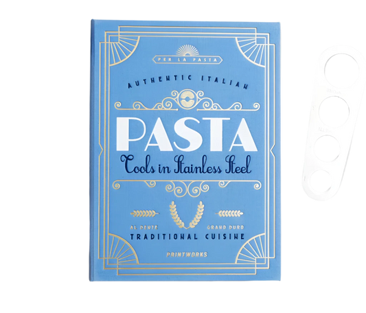 Essential Pasta Kit in an elegant book-like box containing stainless steel spaghetti measurer, serving tongs, and grater—all dishwasher safe for perfect pasta nights.