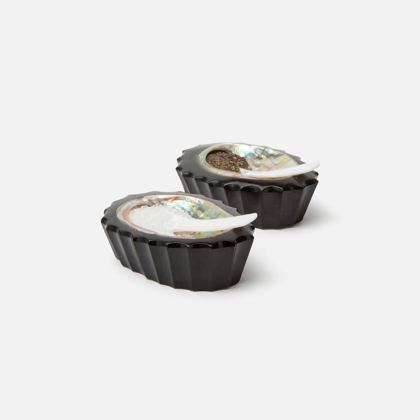 Tilda Pinch Bowls, set of 4, made from ridged black resin with abalone shell accents. Includes miniature serving spoons, each set unique. Easy to clean, avoid water for best care.