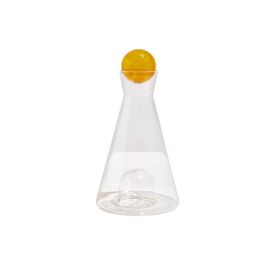 Clear and amber Vice Versa Carafe with a sculptural sphere that can rest in the glass-blown mouth or base, perfect as a centerpiece or stylish serving vessel.