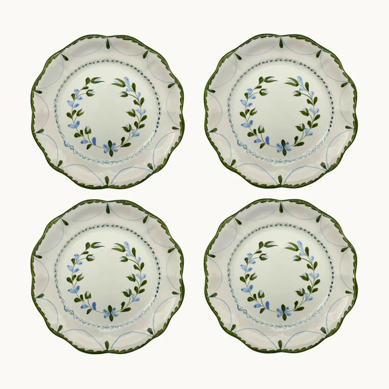 Set of 4 Hand-Painted Flower Plates made in Spain, each uniquely adorned with delicate floral designs created by skilled artisans. Ideal for special occasions or everyday use, these plates highlight slight color variations, making each piece captivatingly unique.