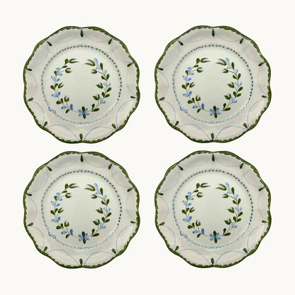 Set of 4 Hand-Painted Flower Plates made in Spain, each uniquely adorned with delicate floral designs created by skilled artisans. Ideal for special occasions or everyday use, these plates highlight slight color variations, making each piece captivatingly unique.