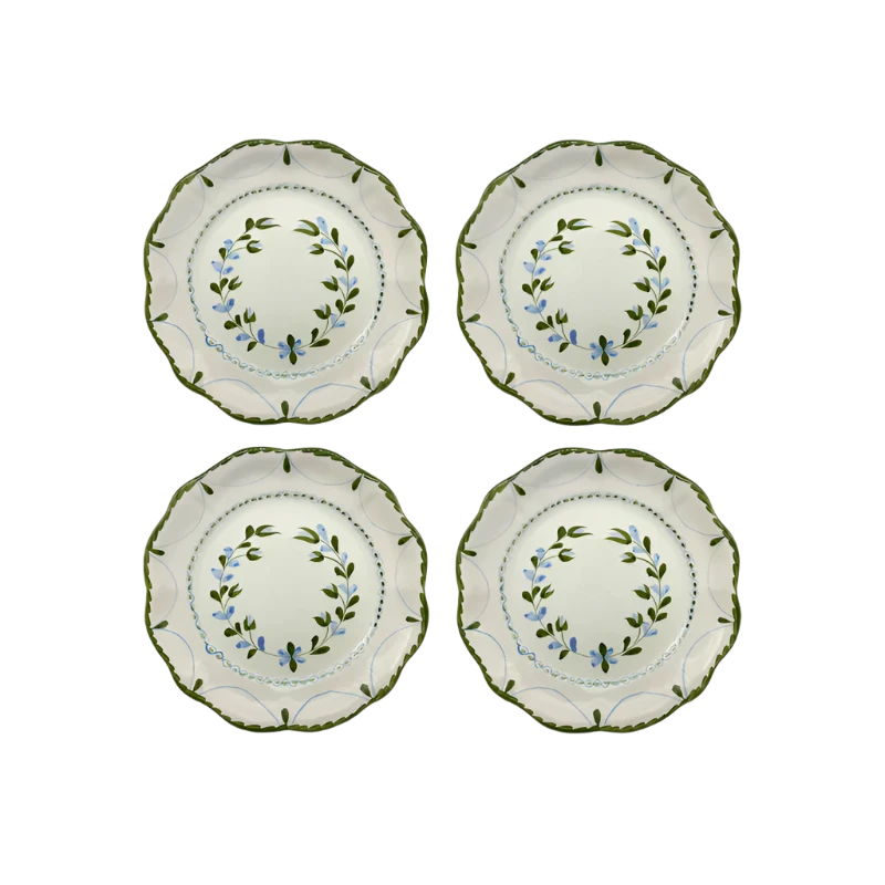 Set of 4 Hand-Painted Flower Plates, each adorned with unique floral designs created by skilled artisans. Perfect for special occasions or everyday use, these plates showcase slight color variations that make each piece captivatingly unique.