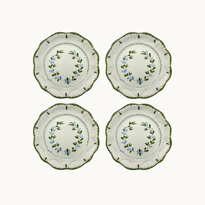 Set of 4 Hand-Painted Flower Plates, each adorned with unique floral designs created by skilled artisans. Perfect for special occasions or everyday use, these plates showcase slight color variations that make each piece captivatingly unique.